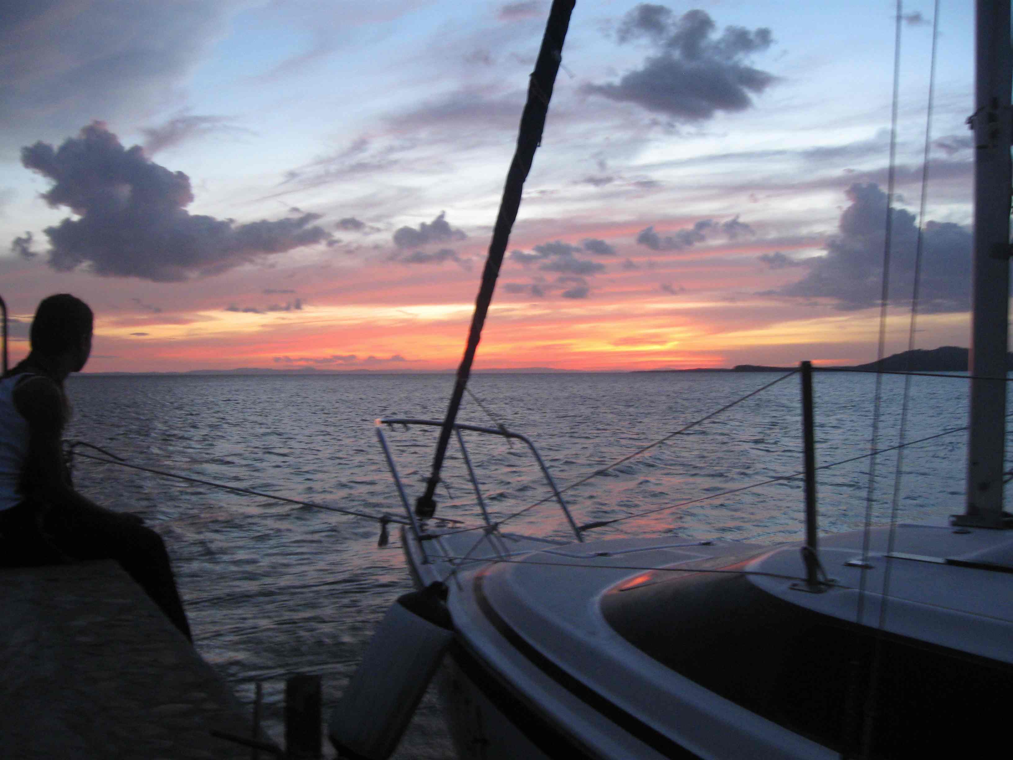 Sunset over the water from a sailboat near Ometepe island, Nicaragua