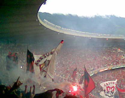 Flamengo fans cheering on their team, photo courtesy of Wikimedia Creative Commons License.