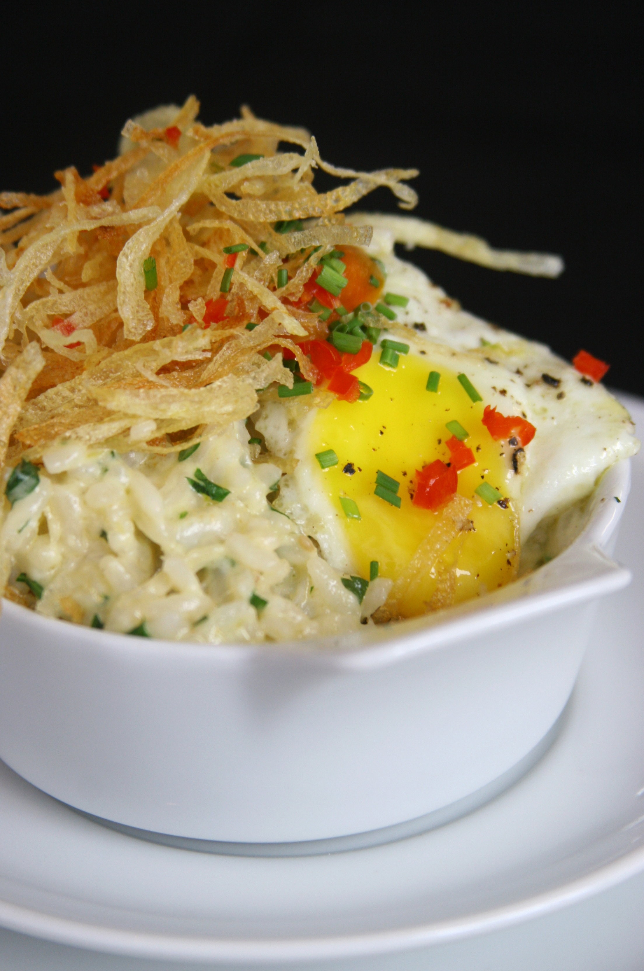 Restaurante Laguiole's codfish rice with fried potato and quail egg, photo courtesy of Abrasel.