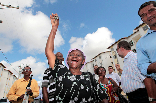 An elated recipient of the Minha Casa Minha Vida program in North Eastern Brazil's state of Bahia, News