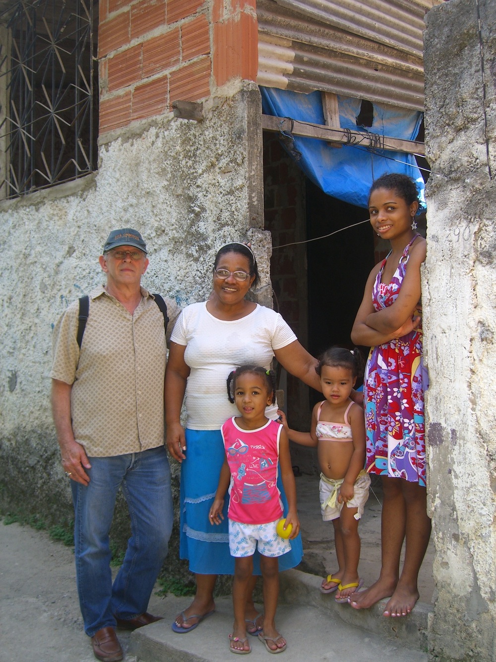 Lance Brown, winner of the 2010 raffle with family in Asa Branca, Rio de Janeiro, Brazil, News
