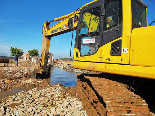 Bulldozers moving in image courtesy of Catcomm