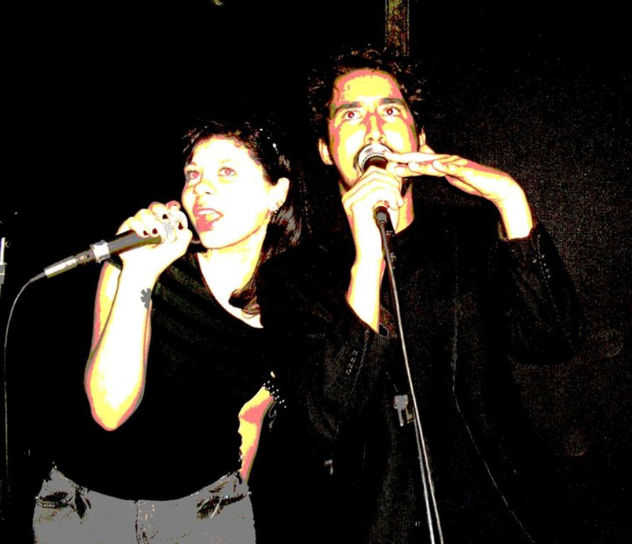 A couple enjoy a good sing at Karaokê Indie, Rio de Janeiro, Brazil, Nrews