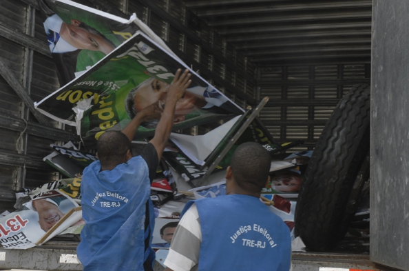 Electoral propaganda posters seized for electoral crimes in the non-pacified favela community of Complexo da Maré, Rio de Janeiro, Brazil News