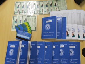 Identification and work card documents seized in the operation, Brazil News