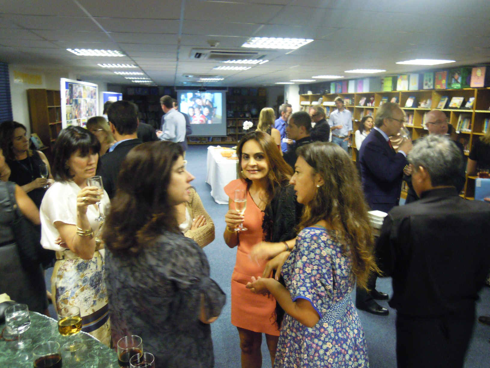 Parents and staff in the event, photo by divulgação.