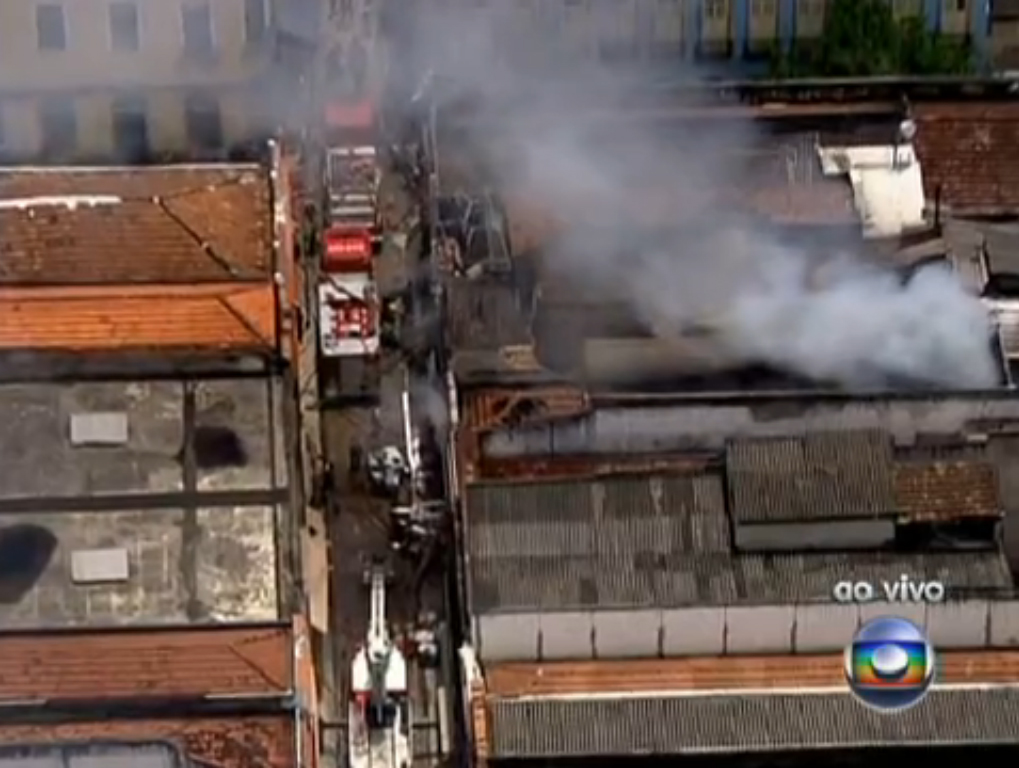 Firemen are fighting to contain the flames, image recreation.