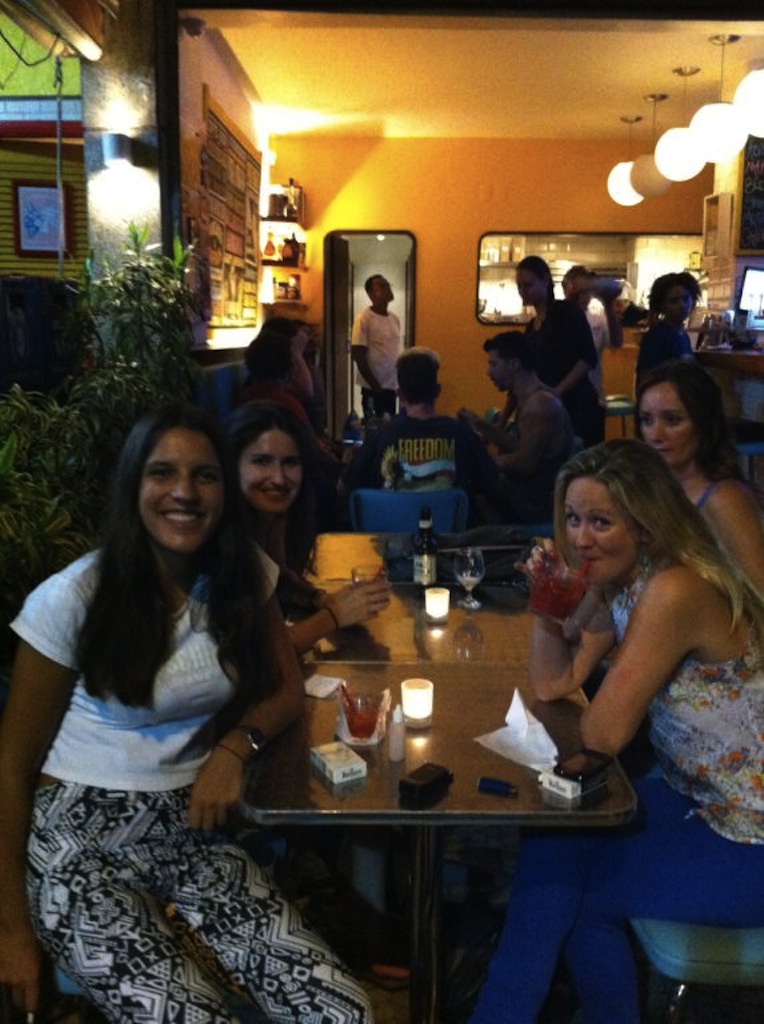 A group of friends enjoy drinks at a Gringo Lounge Thursday event, Rio de Janeiro, Brazil, News.