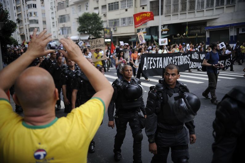 Protesters encircled by police in Brazil