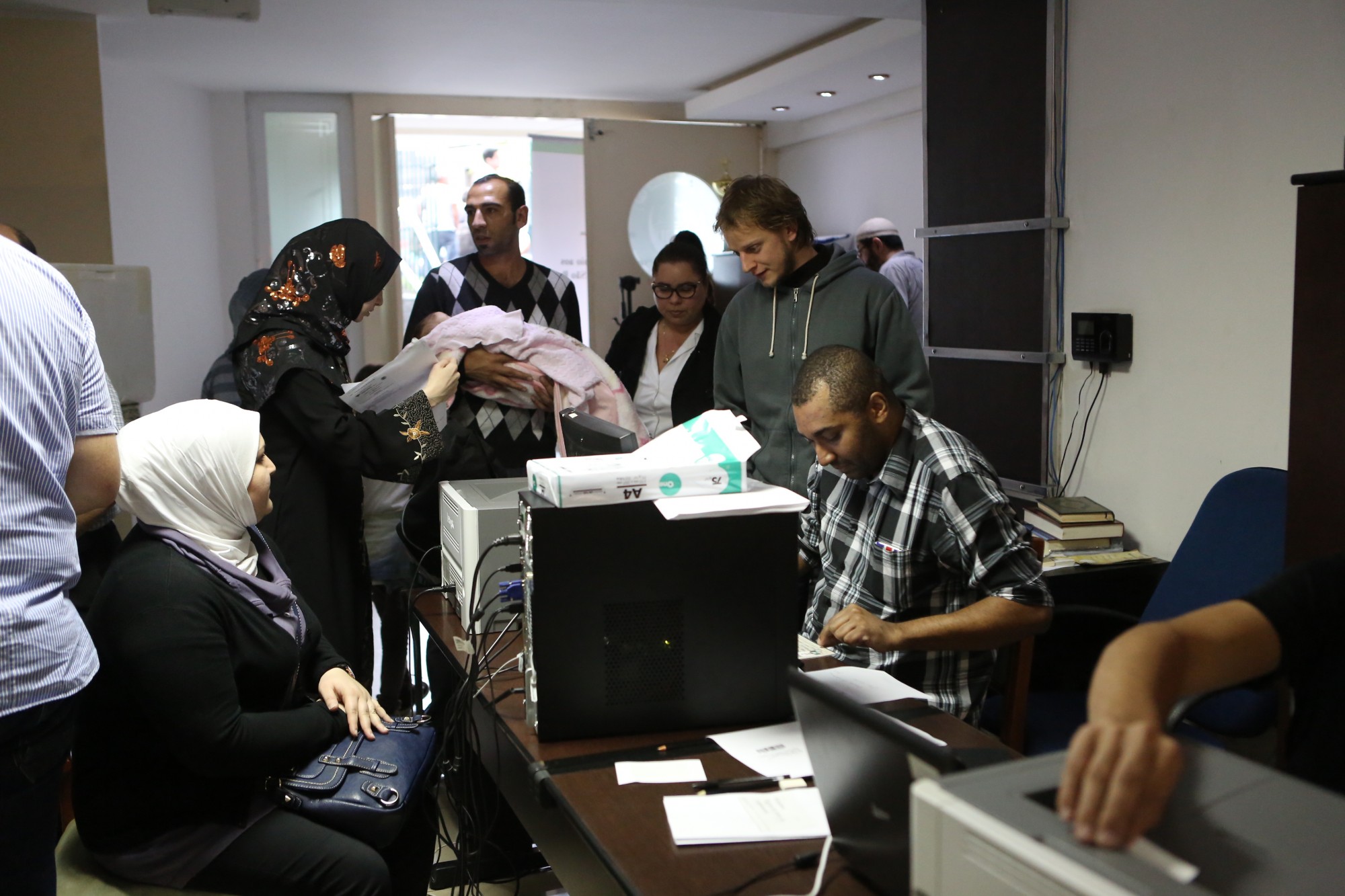 Brazil, Syrians obtain Brazilian documents for work at a refugee center set up in São Paulo city