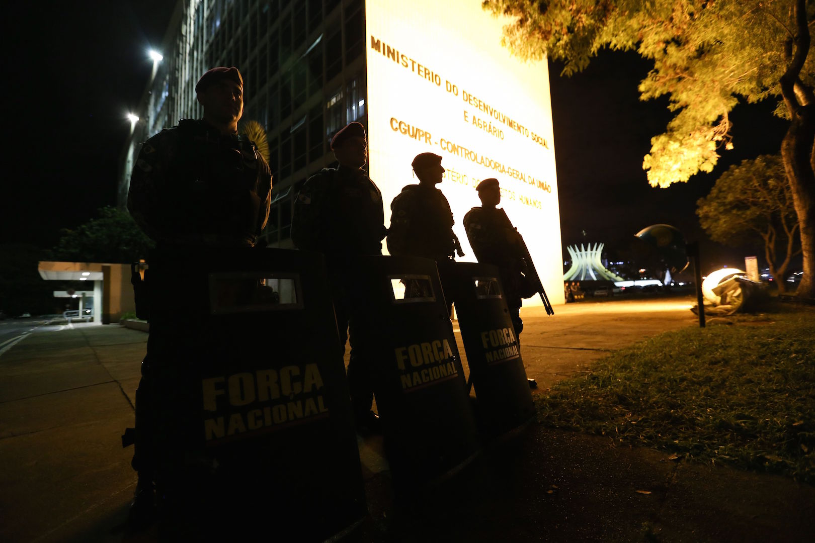 Brazil, Brasilia,Military police officers stand guard to protect Ministry buildings ahead of Wednesday demonstrations,