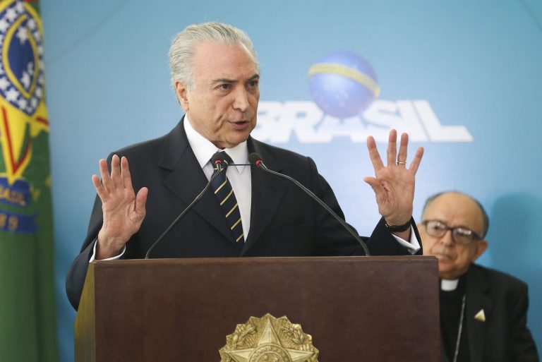 Brazil,President Temer sanctions immigration law but vetoes amnesty clause,