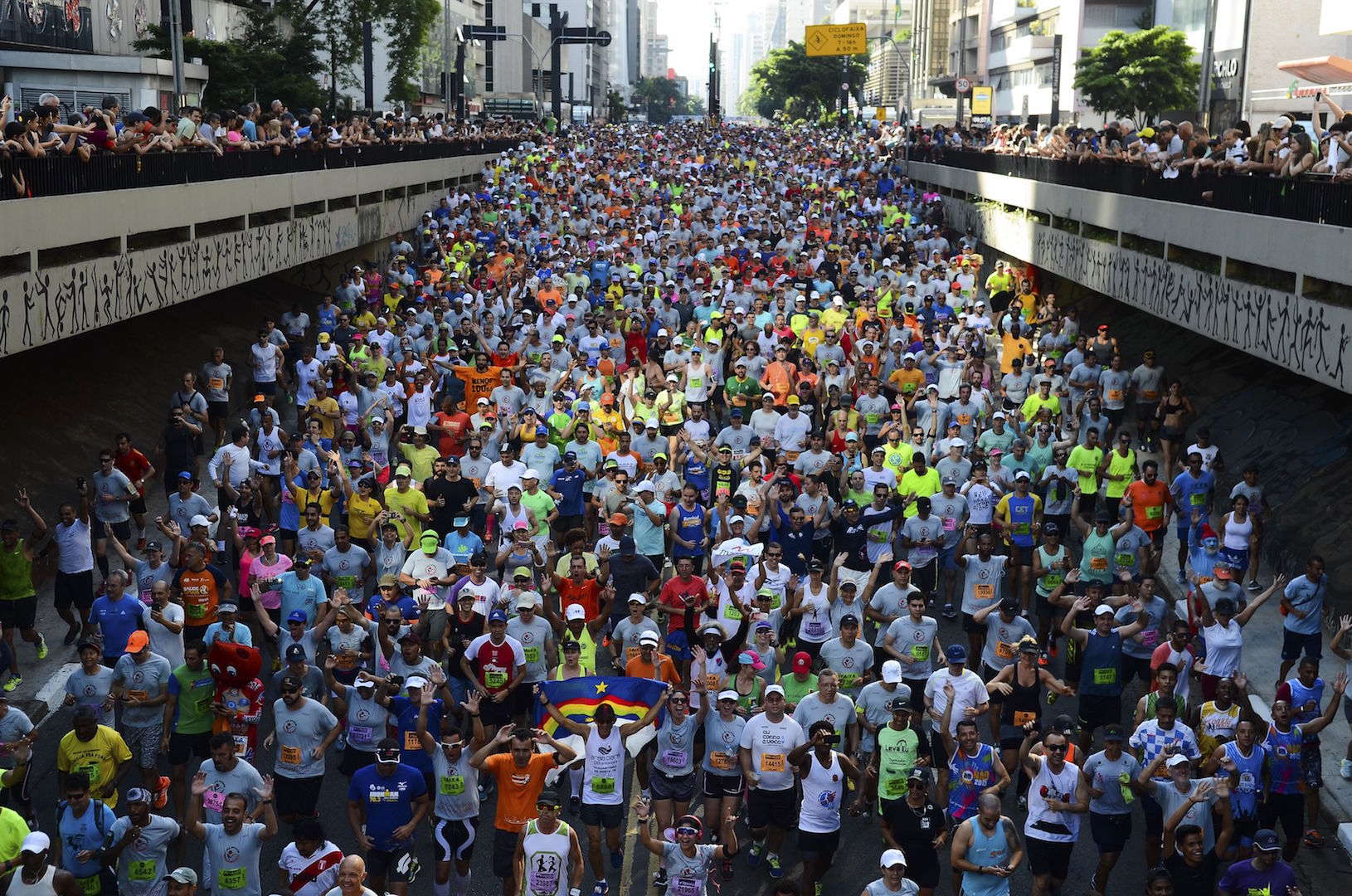 Brazil, São Paulo,Runners and spectators at the São Silvestre race in Avenida Paulista