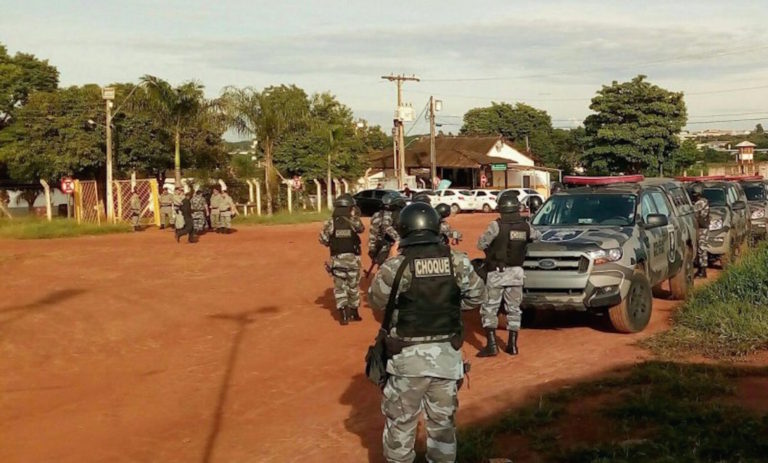 Brazil,Guards outside prison in Goias where nine inmates were killed earlier this month