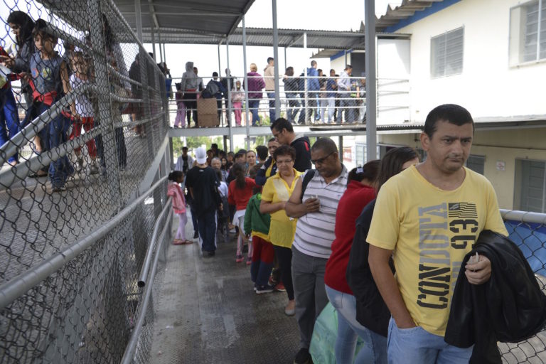 Brazil, São Paulo,People wait in line for vaccine against yellow fever in the northern region of São Paulo city,