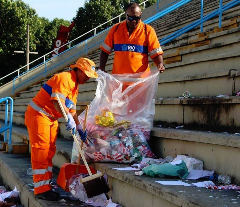 Brazil,Rio's Comlurb workers cleaning up city's sambodromo after samba school parade,