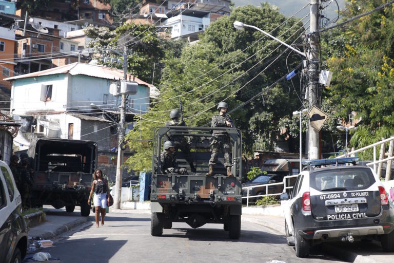 Brazil, Rio de Janeiro,Military personnel patrol the eleven communities which make up the Lins de Vasconcelos favela complex