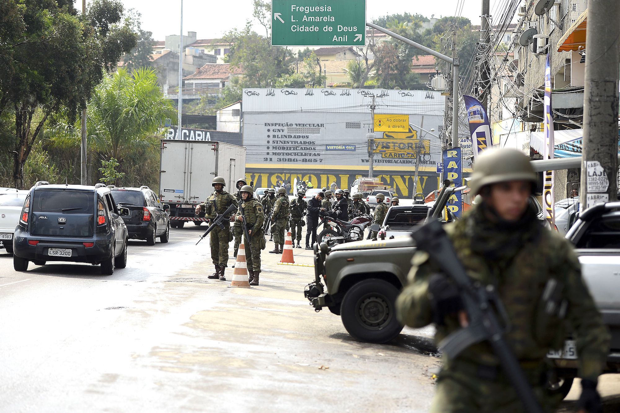 Armed Forces patrol one around the favela communities in Zona Oeste of Rio de Janeiro, Rio de Janeiro, Brazil, Brazil News