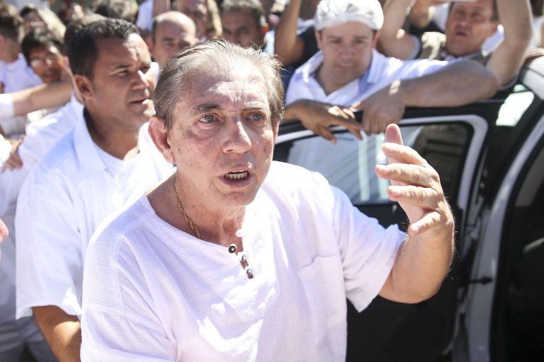 Brazil,João de Deus talks to supporters outside his clinic.