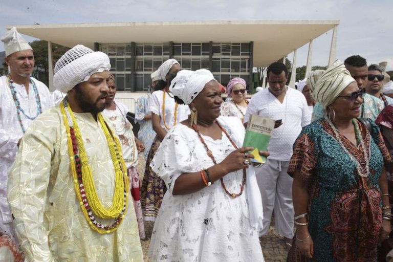 Brazil,Members of African religions gather outside the Supreme Court before the decision.