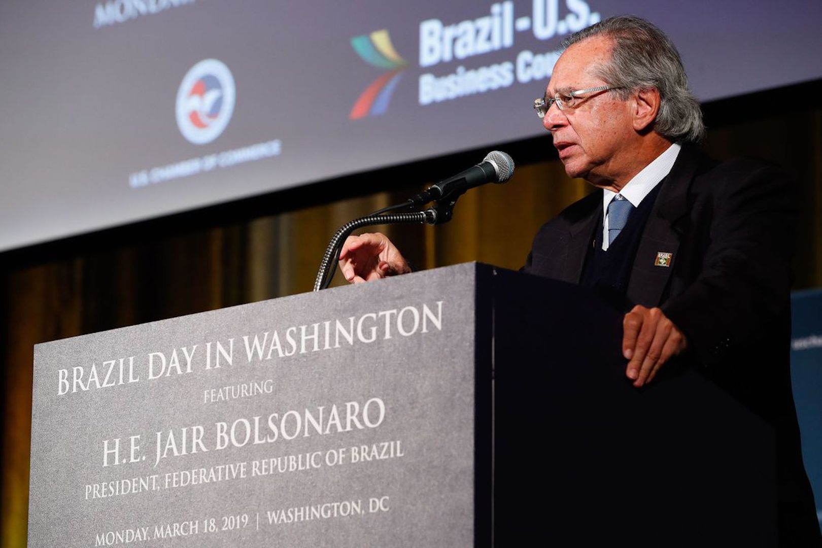 Economy Minister, Paulo Guedes, speaks to businessmen in Washington DC.