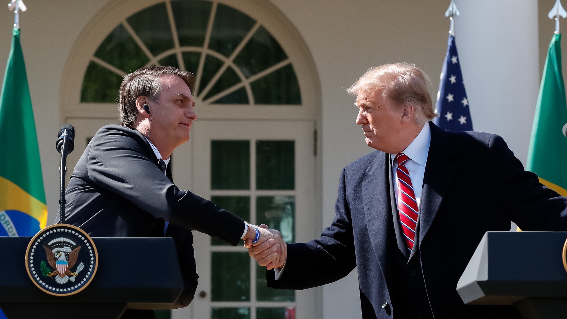 Brazil,Presidents Jair Bolsonaro and Donald Trump shake hands at the White House after two days of meetings.