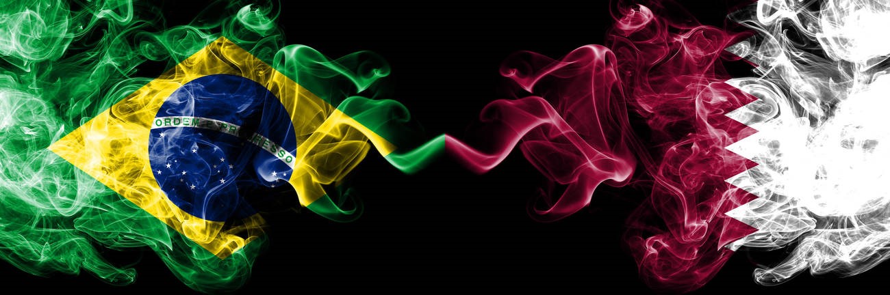 Brazil vs Qatar, Qatari smoke flags placed side by side. Thick colored silky smoke flags of Brazilian and Qatar, Qatari