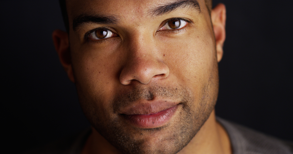 Handsome black man looking at camera