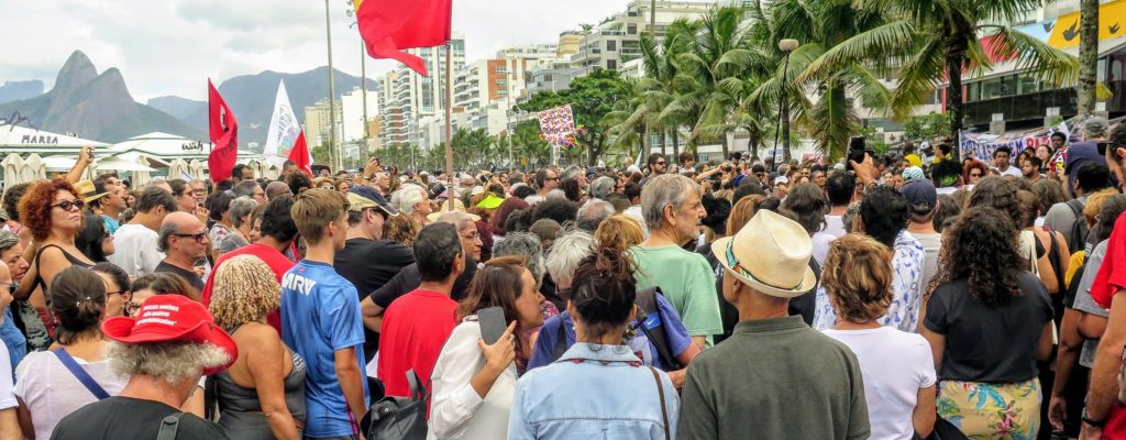 Photo Caption: A number of different community organizations from throughout the city came together on Sunday to raise awareness of the escalating police violence happening within favela communities in Rio, Rio de Janeiro, Brazil, Brazil News,