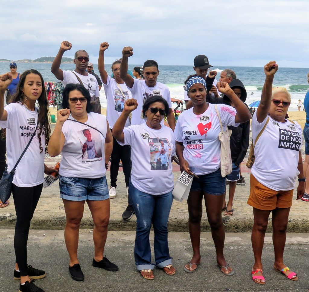 Photo Caption: Many of the mothers and relatives of individuals killed during police operations came to Ipanema beachfront wearing pictures of their lost loved ones on their t-shirts, Rio de Janeiro, Brazil, Brazil News,