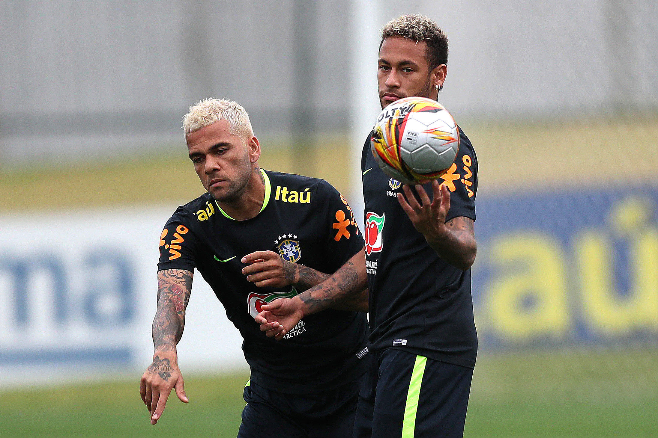 Brazil's national soccer team players Dani Alves (L) and Neymar participate in a training session in Teresopolis, Rio de Janeiro, Brazil, 03 October 2017. Brazil will face Bolivia next Thursday for the Russia 2018 World Cup qualifiers. EFE/Marcelo Sayao