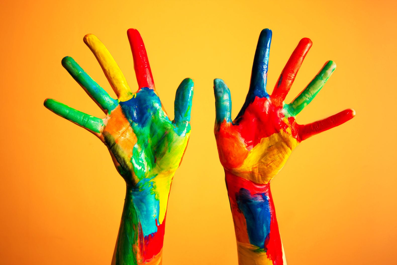 Colourful painted hands - creativity / artist / artistic / ideas / happiness / diversity concept