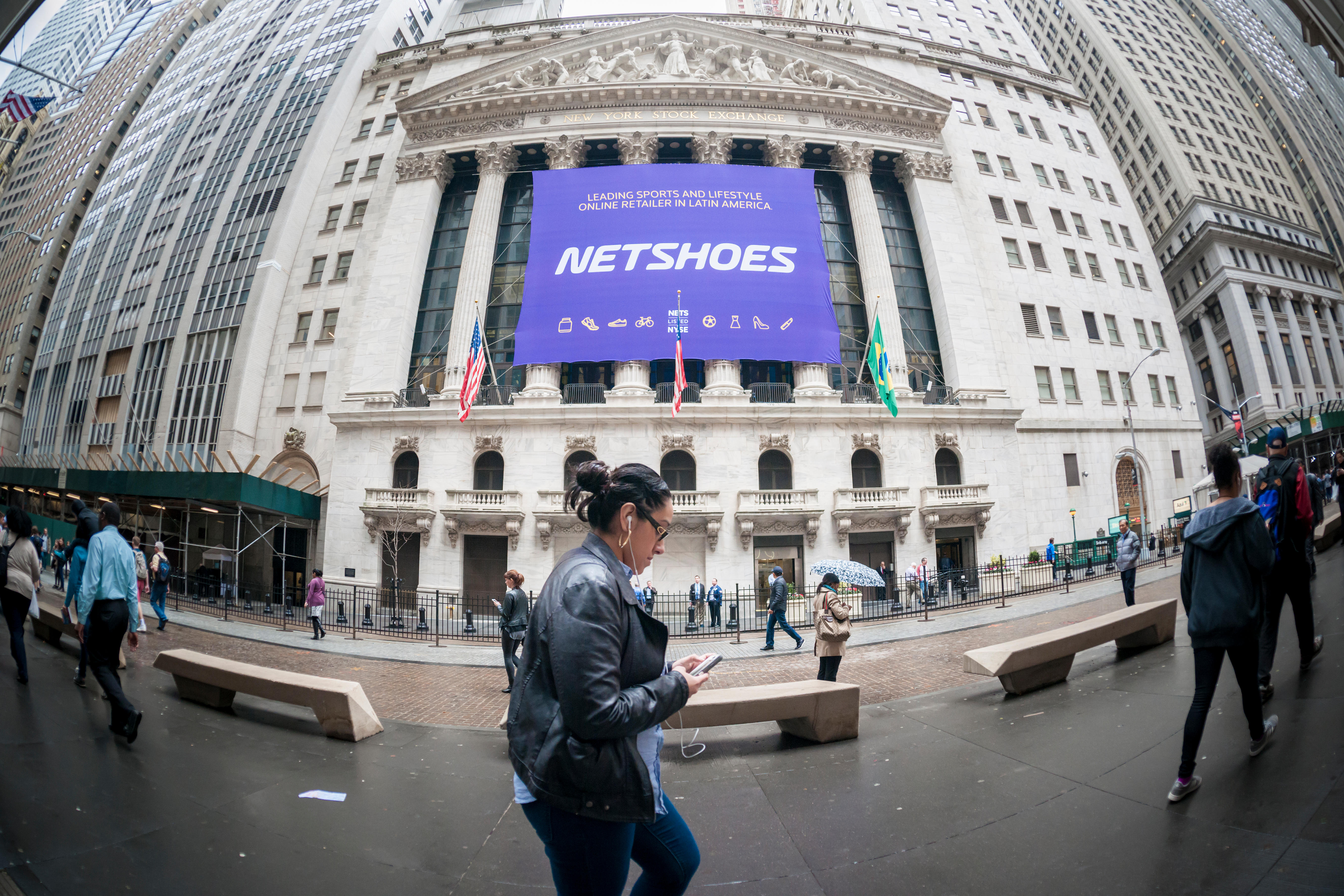 The New York Stock Exchange is decorated for the initial public offering of Netshoes on Wednesday, April 12, 2017. Netshoes (Cayman) Ltd. sells sports and lifestyle products online in Latin America. (© Richard B. Levine)