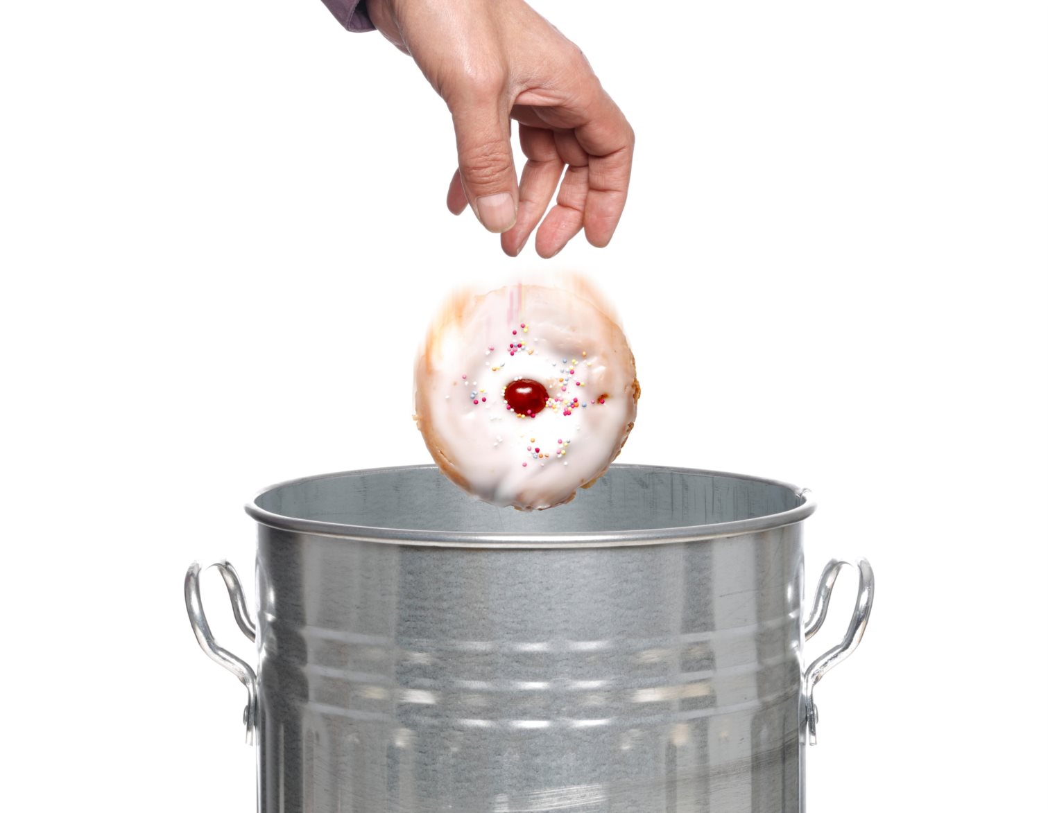 Person throwing cake into dustbin.