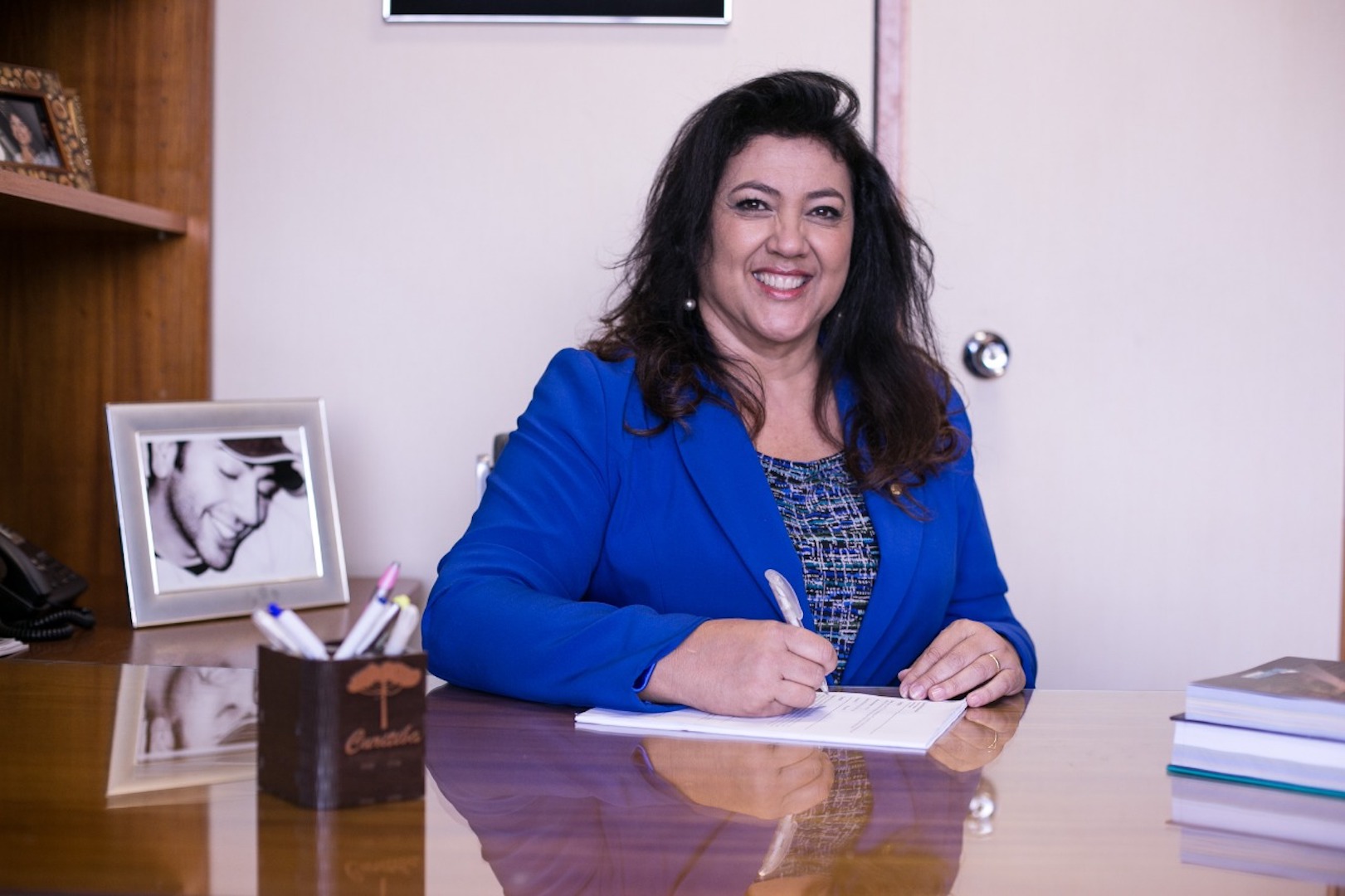 Federal Representative Christiane Yared has a photograph of her son, killed in an auto accident, in her office in Brasilia