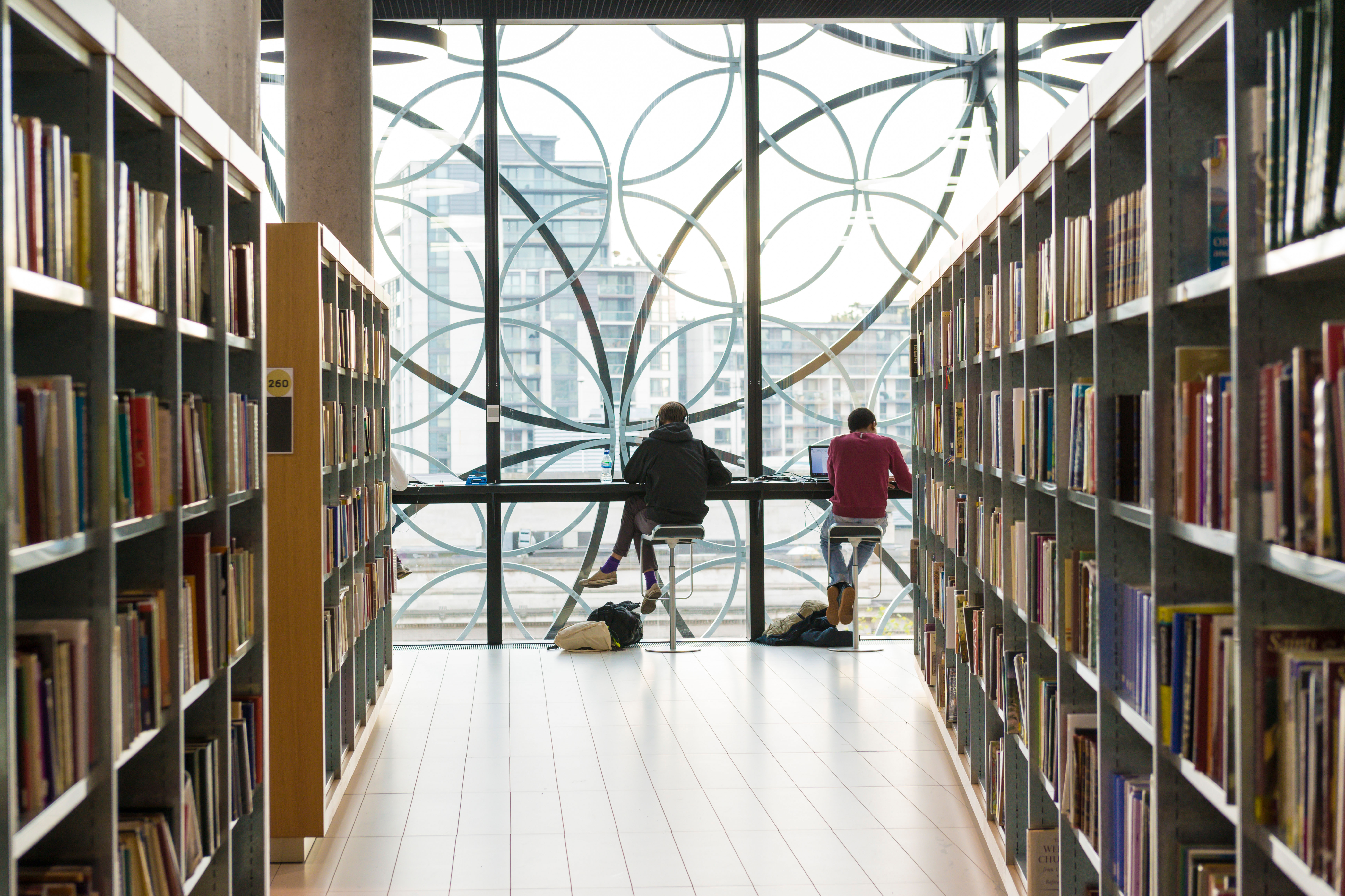 Students working at the new Library of Birmingham, Birmingham, England