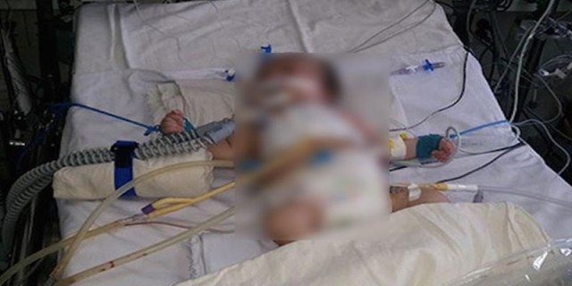 A couple-month-old baby in intensive care after a two-hour rape.