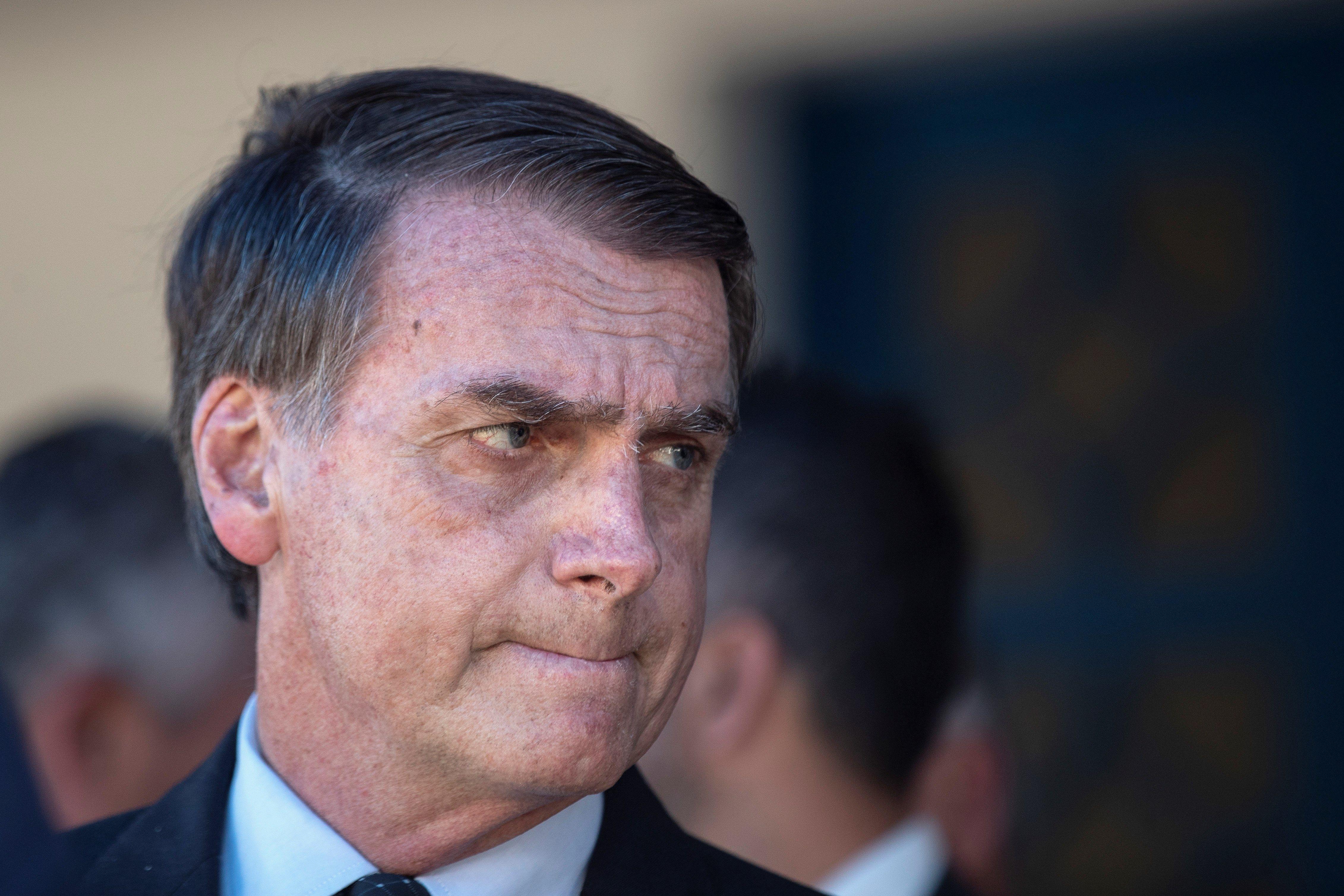 Brazilian president-elect Jair Bolsonaro (C) attends a military ceremony on the occasion of the graduation of the new Aeronautical officers, in Guaratingueta, Sao Paulo (Brazil), 30 November 2018. EFE/ Sebastiao Moreira