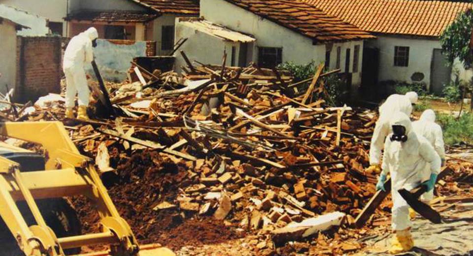 Workers disassemble a contaminated home after it was exposed to high levels of radiation (Photo: IAEA)