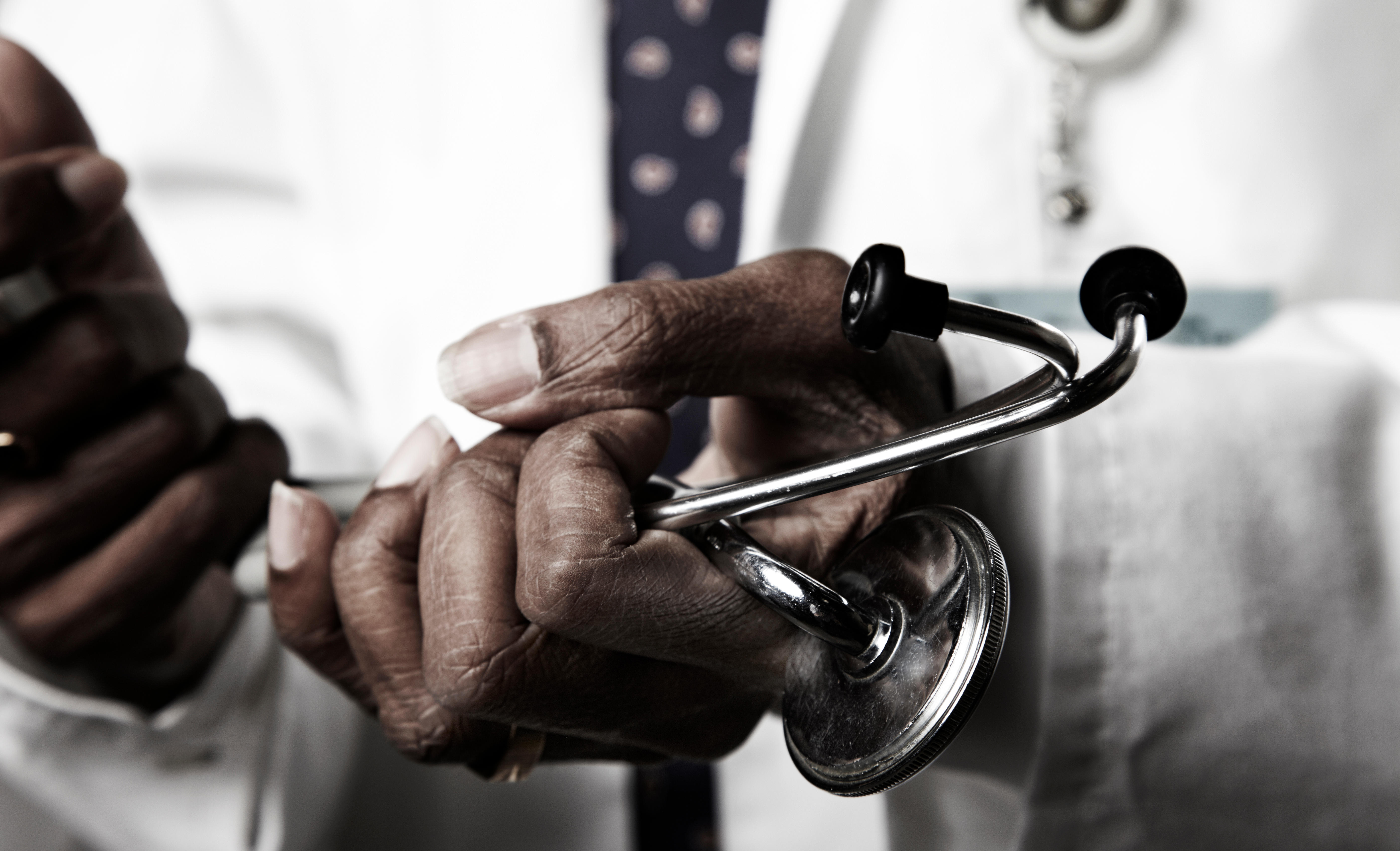 Doctor holding stethoscope