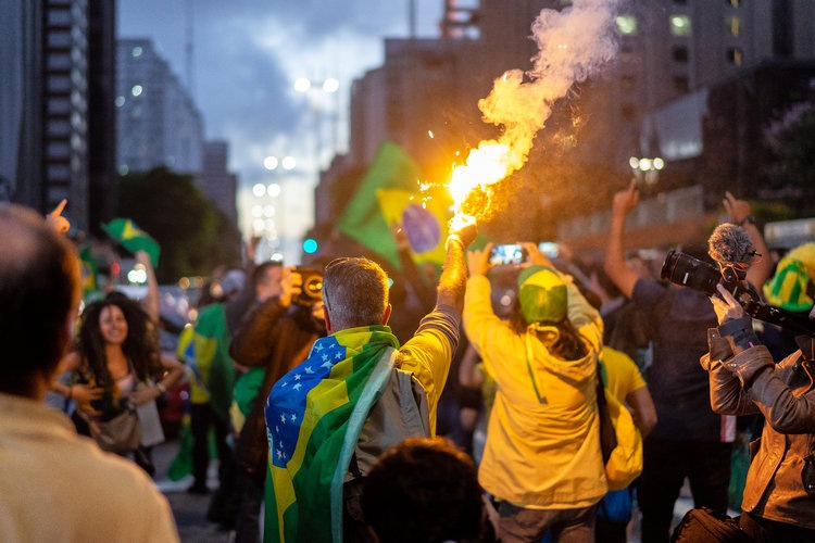 Supporters of Jair Bolsonaro celebrate following his election last year (Photo C.H. Gardiner)
