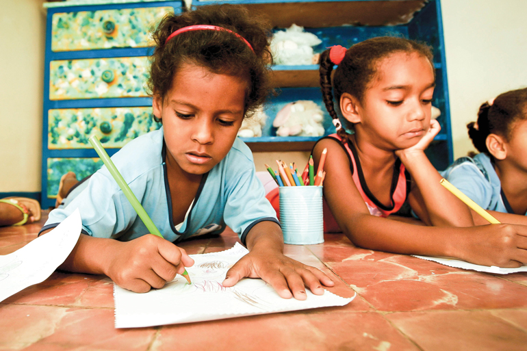families must ensure that the children attend school and are vaccinated.