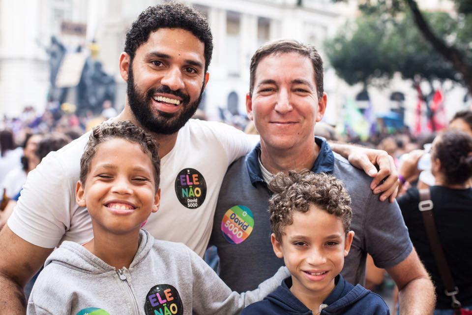 Deputy David Miranda, his husband journalist Glenn Greenwald and their children.