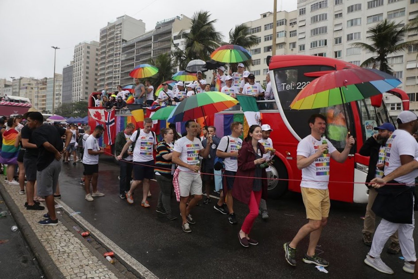 Brazil,Despite the drizzle which fell on parade goers throughout the day, more hundreds of thousands showed up for the LBGTi parade in Copacabana Beach in Rio.