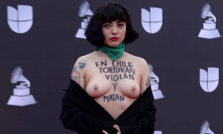 Chilean Singer Protests Topless on Latin Grammy Awards Red Carpet