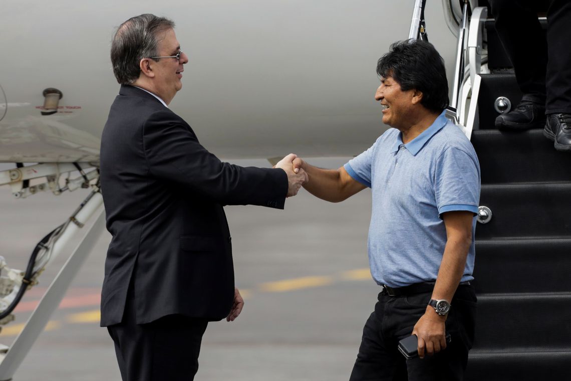 Mexican Foreign Minister Marcelo Ebrard and Bolivian ex-President Evo Morales.