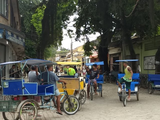 On arrival in Paquetá, the friendly square announces a car-free world with bicycle taxis, bicycles, and electric buggies. No traffic.