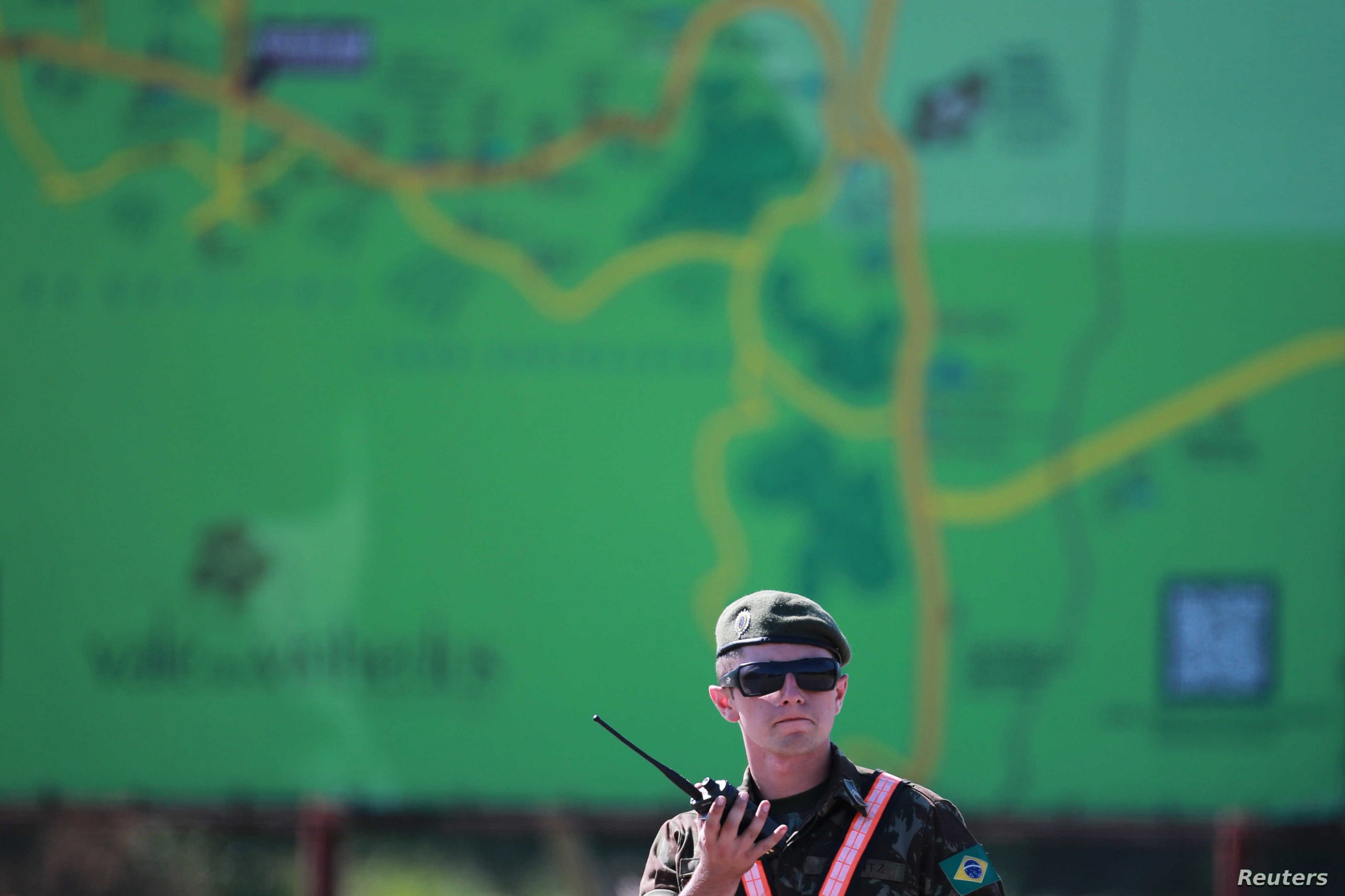 A soldier of the Brazilian army stands guard near the Spa de Vinho hotel, which will host the next Mercosur summit, in Bento Goncalves
