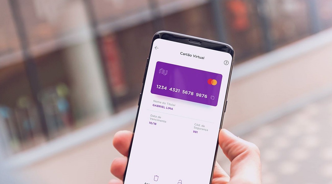 In Nubank, the debit card is optional: you can request it through the Nubank app by tapping on its name and then on Request Debit Function.
