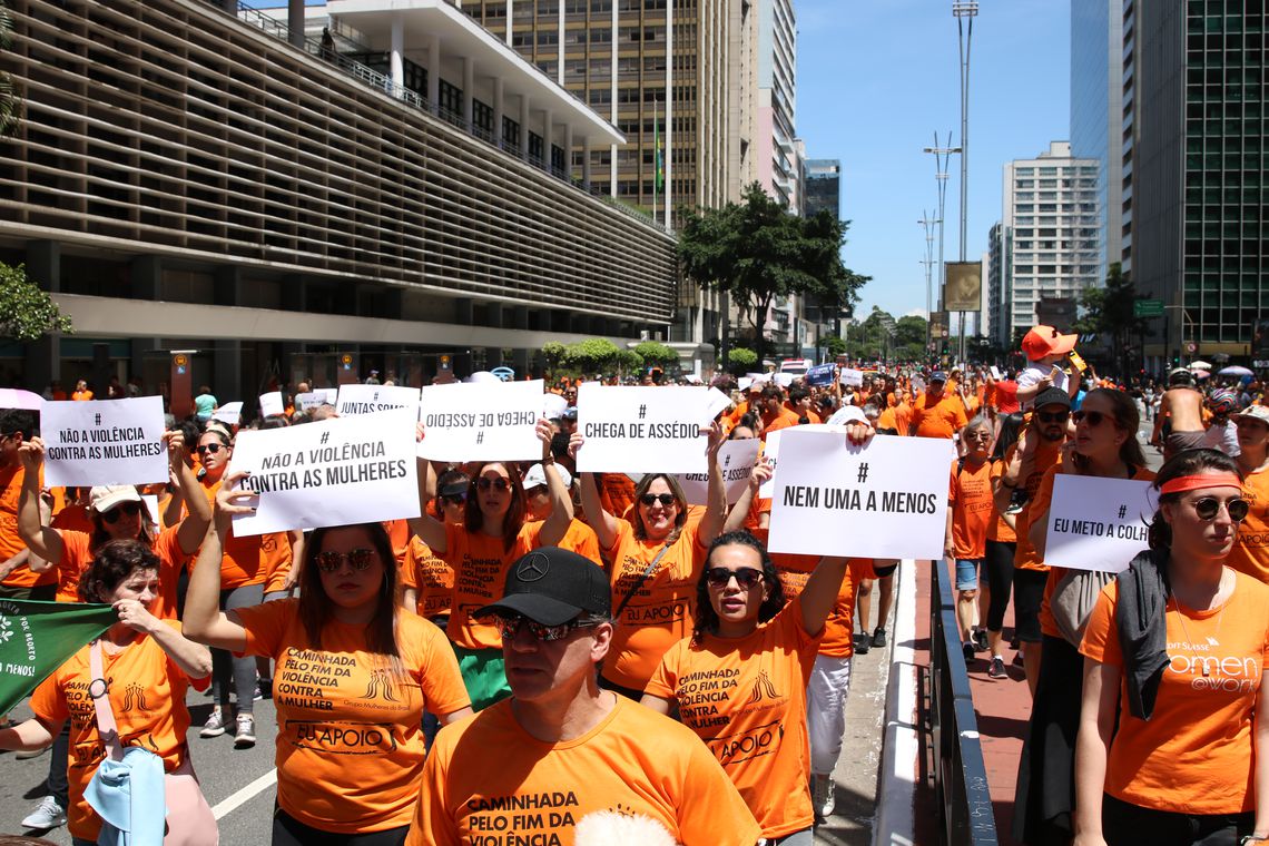 Dressed in an orange T-shirt with words that called for an end to femicide and violence and with shouts of 'Together, We Are Stronger', the women walked along Paulista Avenue.
